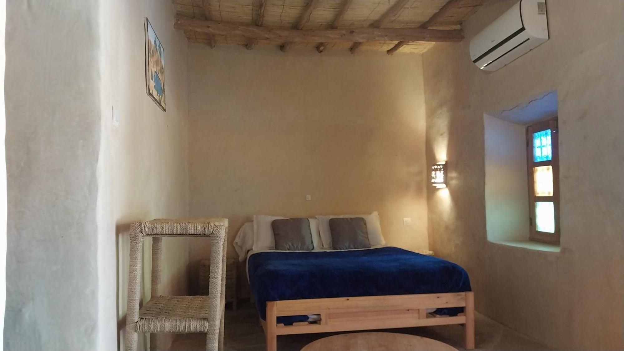 Auberge Bassou Nkob Rom bilde